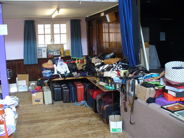 A corner of the Jumble Sale devoted to every sort of bag from purses to suitcases