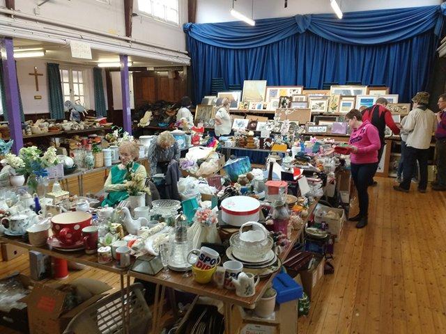 The centre of the main Jumble Sale room, with tables full of housewares